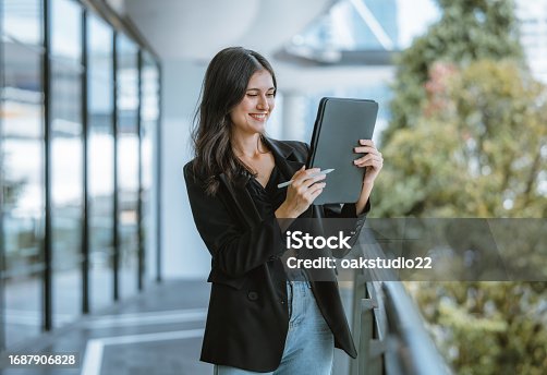 istock Millennial digital nomads work remotely, using laptops to connect , create content on the move. 1687906828