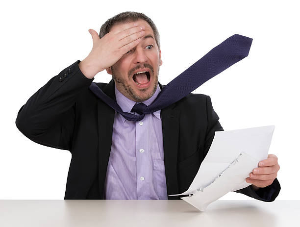 istock Businessman is horrified by a unbelievable bill  IV 168792485