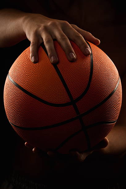 istock Basketball ball in male hands 168794481