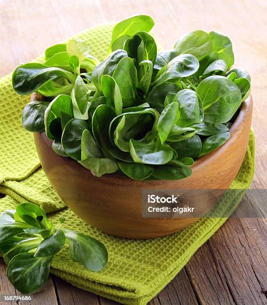 Fresh Green Salad Valerian In A Wooden Bowl Stock Photo - Download Image Now - Appetizer, Food, Food and Drink