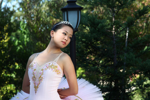 Young Ballet Dancer Standing and Looking Away