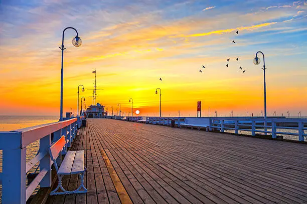 Sunrise at the pier in Sopot, Poland.