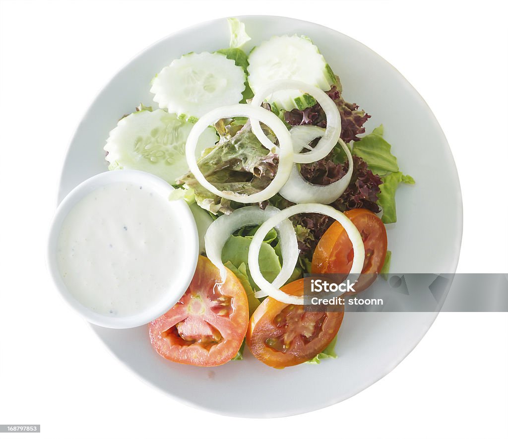 Fresh vegetables salad Fresh vegetables salad isolated on white background Crockery Stock Photo