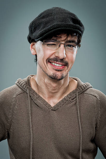 istock Young Cute Man Winking with a Beret 168799416
