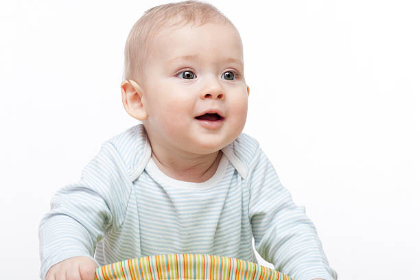 istock 9 months boy looks happy 168800143