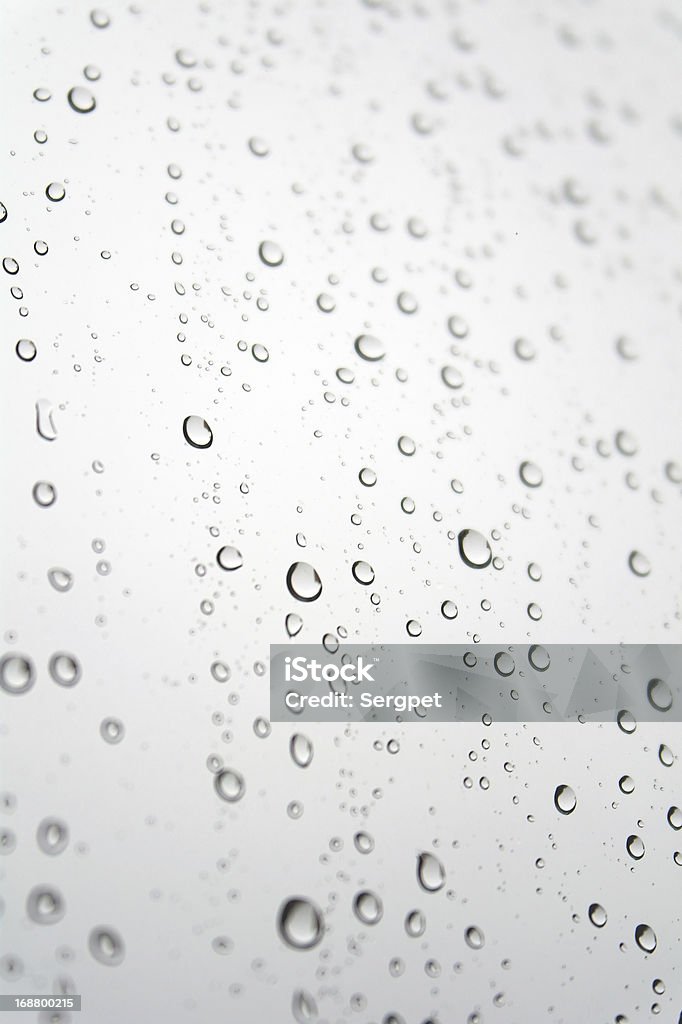 Gotas de lluvia en la ventana inclinado - Foto de stock de Abstracto libre de derechos