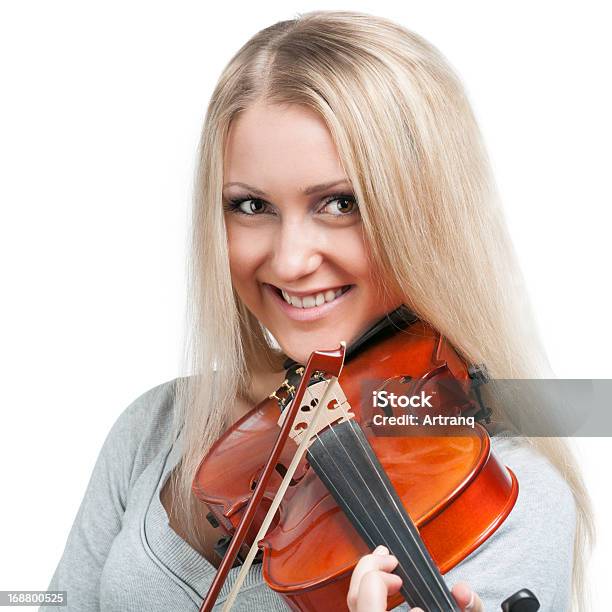 Smiling Woman Playing The Violin Stock Photo - Download Image Now - Adult, Adults Only, Artist