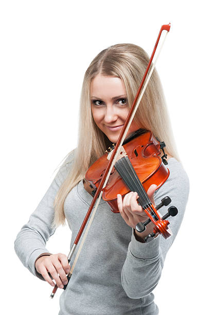 istock young smiling girl playing the violin 168800528