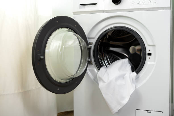 istock Close up of washing machine in a laundry room 1688005884