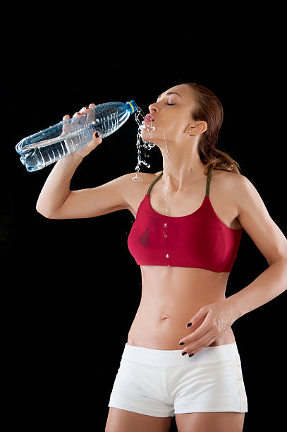 istock Young Woman Hydrating After Exercise 168801421