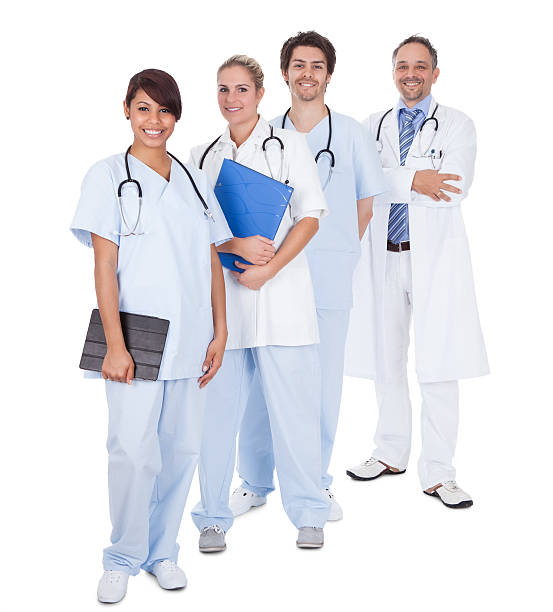istock Group of doctors standing together over white 168801863