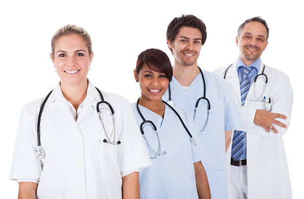 istock Group of doctors standing together over white 168801875
