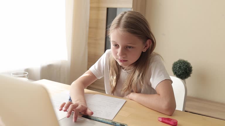 children doing homework at home