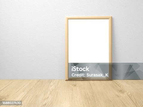 istock Blank frames mockup on wooden floor 1688027430