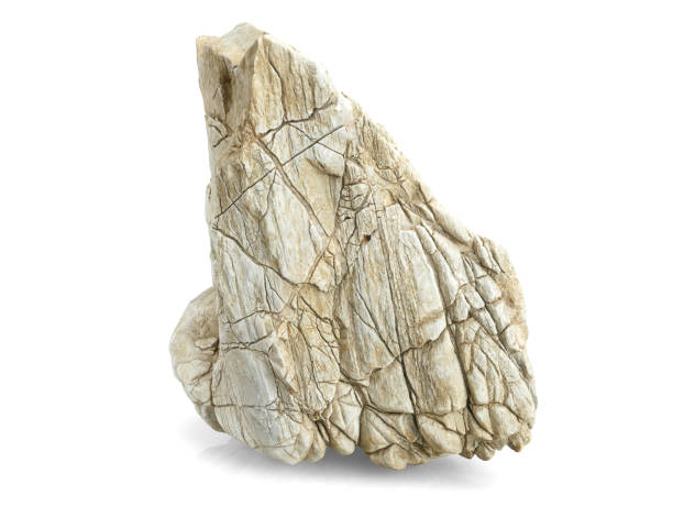istock Single natural stone on white background, selective focus with shallow depth of field. 1688029718
