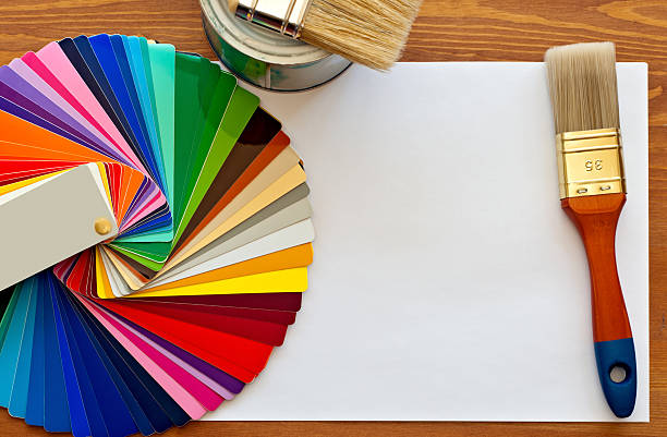 color samples and paint brushes stock photo