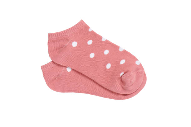 istock Pink polka dot ankle socks on white background, isolated 1688047470