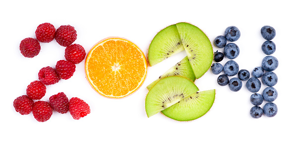 Mixed fruits. New year 2024 made of fruits on the white background. Healthy food