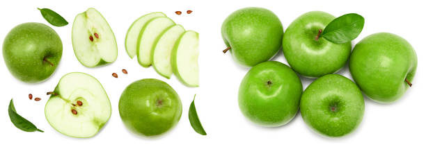 istock green apples with green leaf and slices isolated on a white background. clipping path. top view 1688060492