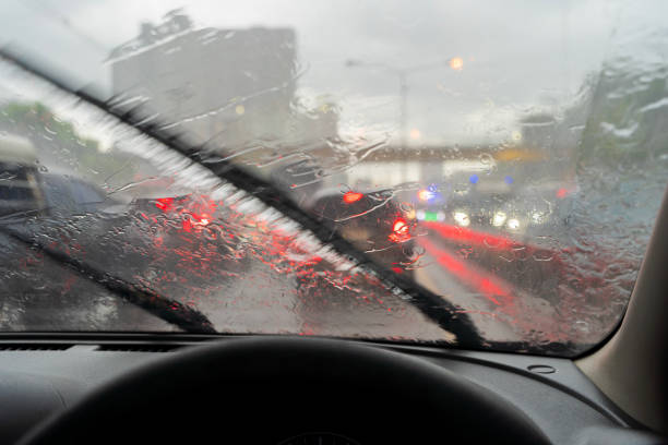 istock Heavy rain, visibility is difficult. Turn on the wiper to help solve the problem. So that you can see the front. The problem is very traffic jam. 1688067490