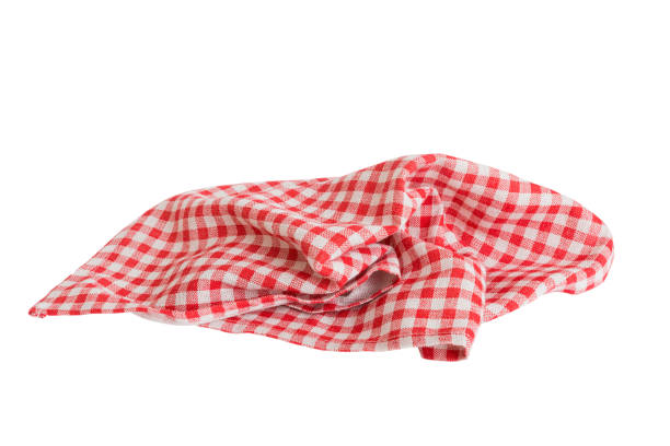 istock Red textile napkin isolated on white background. Folded decorative kitchen cotton towel. Top view 1688070309