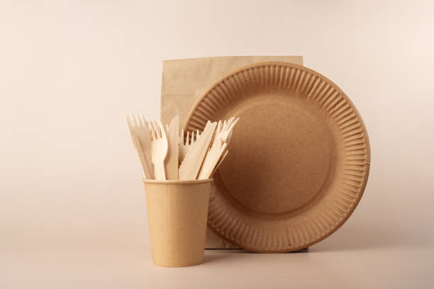 istock Eco-friendly cardboard dinnerware for parties, eating utensil eco, environmental protection, garbage sorting, takeaway food, recyclable waste 1688096100