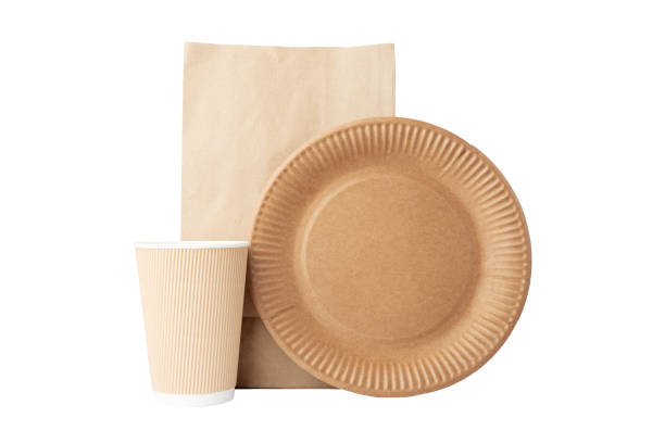 istock Disposable wooden cutlery set for takeaway meals isolated, zero waste tableware, biodegradable ecological organic cardboard plate, with hot drink cup and craft lunch bag,environmental protection 1688098369