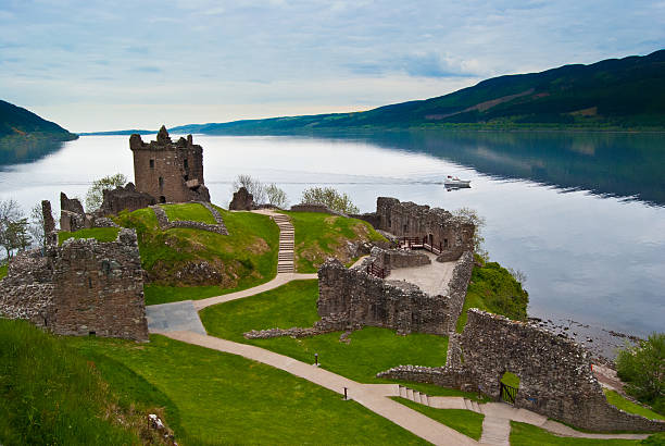 View of Urquhart Castle on a nice day famous Urquhart Castle at Loch Ness in Scotland scottish highlands castle stock pictures, royalty-free photos & images