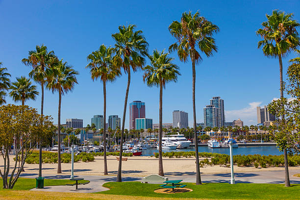 Long Beach, CA Rainbow Harbor with city skyline at Long Beach , CA long beach california photos stock pictures, royalty-free photos & images