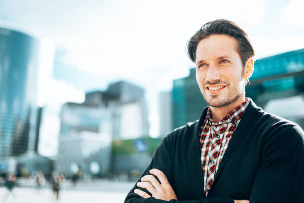 istock happiness business man with arm crossed 1688103515