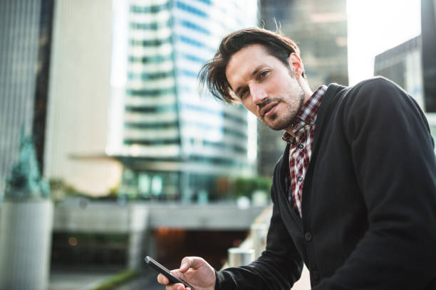 istock business man on the phone in Paris 1688107913