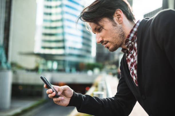 istock business man on the phone in Paris 1688108529
