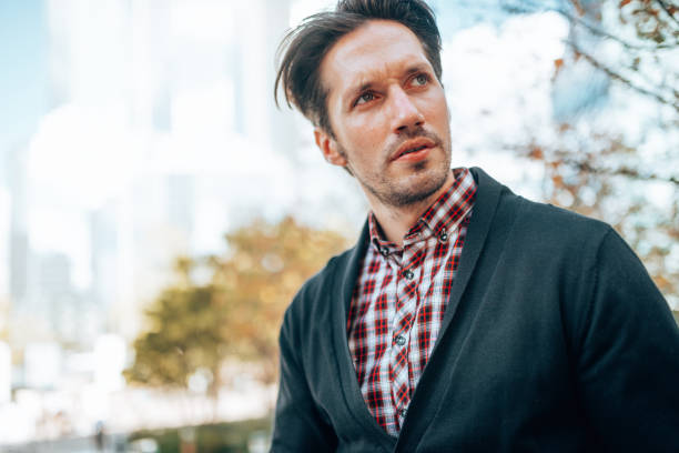 istock pensive business man with arm crossed 1688110173