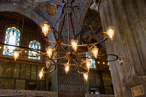 Istanbul, Turkey - July 06, 2018: Old chandelier in the Blue Mosque (also known as the Sultan Ahmed Mosque). Is an Ottoman-era historical imperial mosque (was constructed between 1609 and 1616).