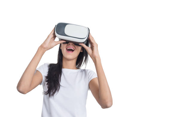 istock Women using VR-headset glasses of virtual reality on isolated white background,future technology concept. 1688122423