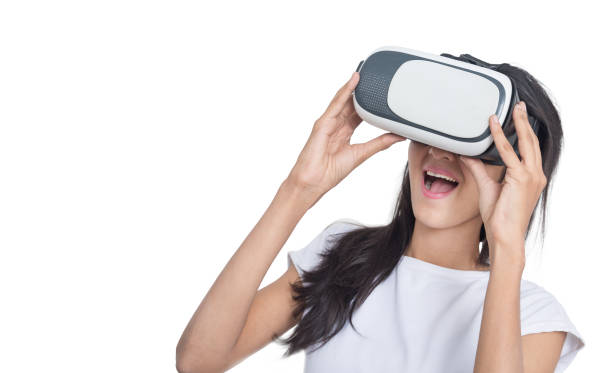 Asian Girl with Smart phone using VR Box google 3D Virtual Reality Glasses headset , Asian woman with Modern imaging Future technology.