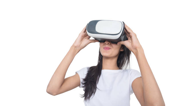 istock Women using VR-headset glasses of virtual reality on isolated white background,future technology concept. 1688124064