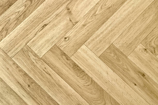 artificial parquet floor full frame detail of a artificial wooden parquet floor faux wood stock pictures, royalty-free photos & images