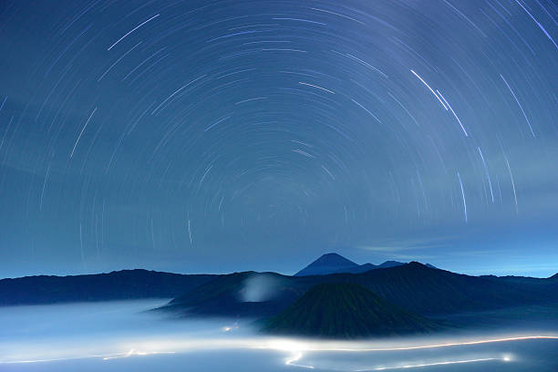 istock Star trail at Bromo volcano in Indonesia 168813429