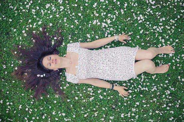 istock Beautiful woman in apple blossoms 168814516