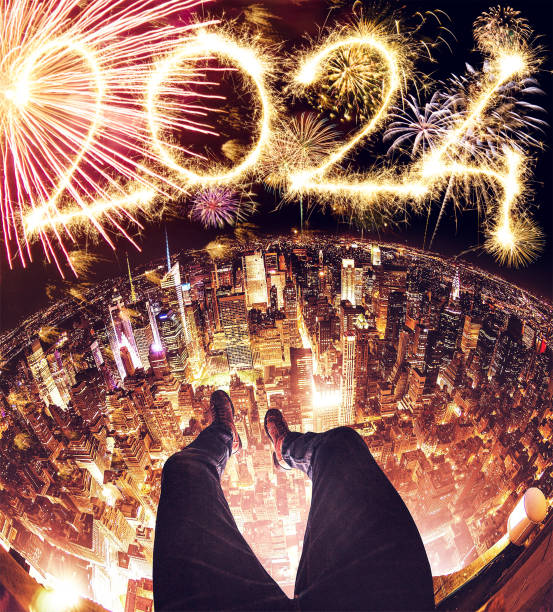 watching the new year 2024 fireworks watching the new year fireworks new years eve new york stock pictures, royalty-free photos & images