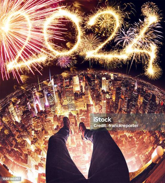 Watching The New Year 2024 Fireworks Stock Photo - Download Image Now - 2024, New Year's Eve, Innovation