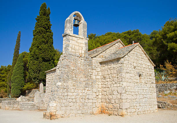 istock Small rural stone church 168816394