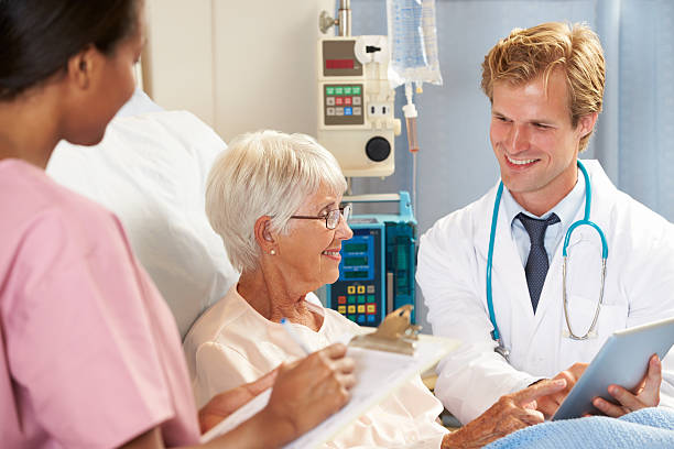 istock Doctor Using Digital Tablet In Consultation With Senior 168816570