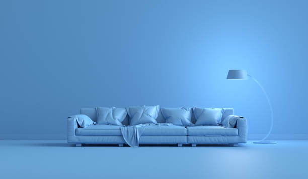 istock Monochrome blue interior with modern leather sofa and a floor lamp with copy space. 1688186498