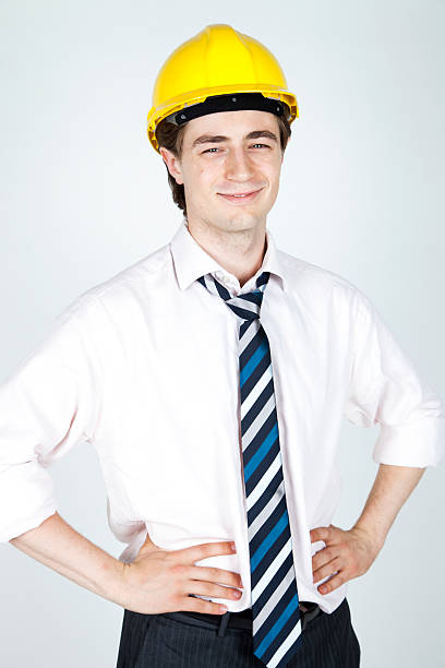 istock Young Man in Suit and Hard Hat 168820096