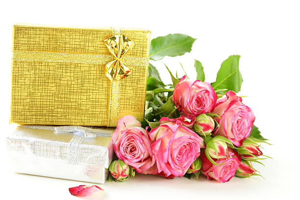 istock pink roses and box with gifts 168821366