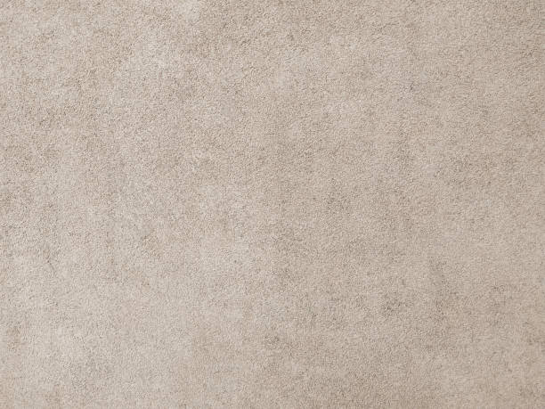 istock Concrete wall with grunge texture. An old plaster cement surface, beige abstract background. 1688225500