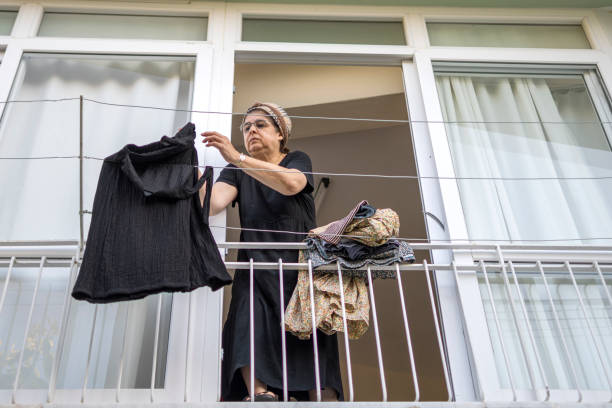 Clothes hung out to dry on lines outside the balcony