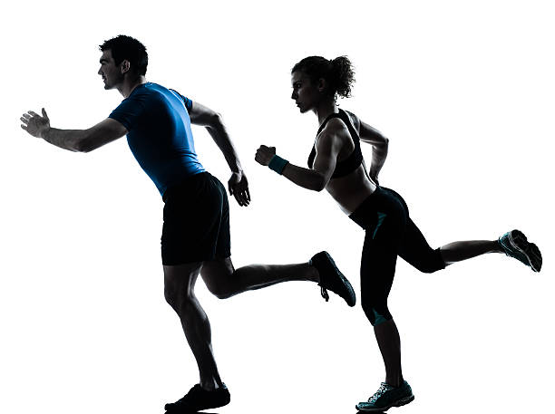 istock man woman runner running jogging sprinting 168823520